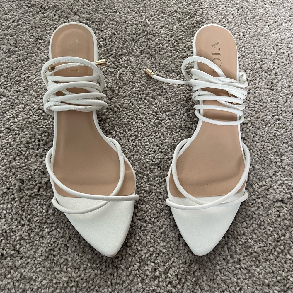 Vici. White kitten heel.